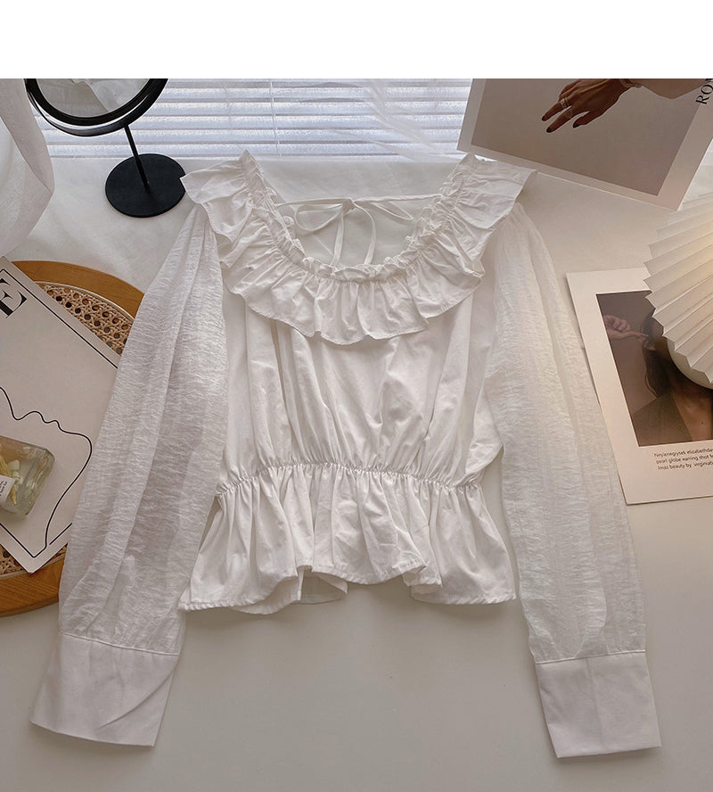 Chemise à lacets, col rond et volants, taille fine 6434