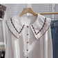 Korean version of thin Hong Kong style retro art doll collar single breasted top  6402