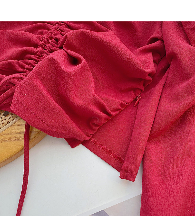 La chemise à manches longues plissée avec cordon de serrage montre un haut de tempérament mince 6421