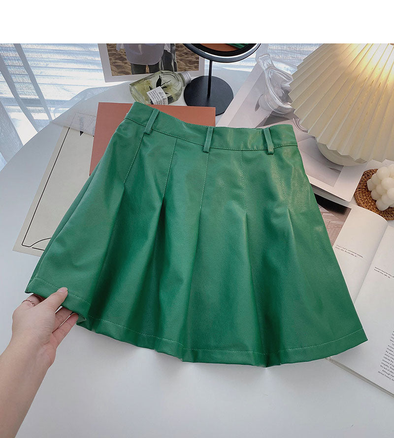 Koreanischer dünner modischer altersreduzierender Faltenrock aus Leder mit hoher Taille 5461