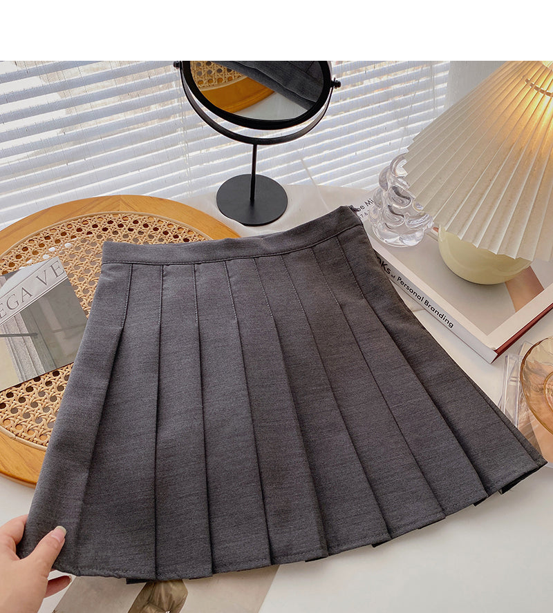 Pleated skirt is a popular solid color high waist A-line skirt  5357