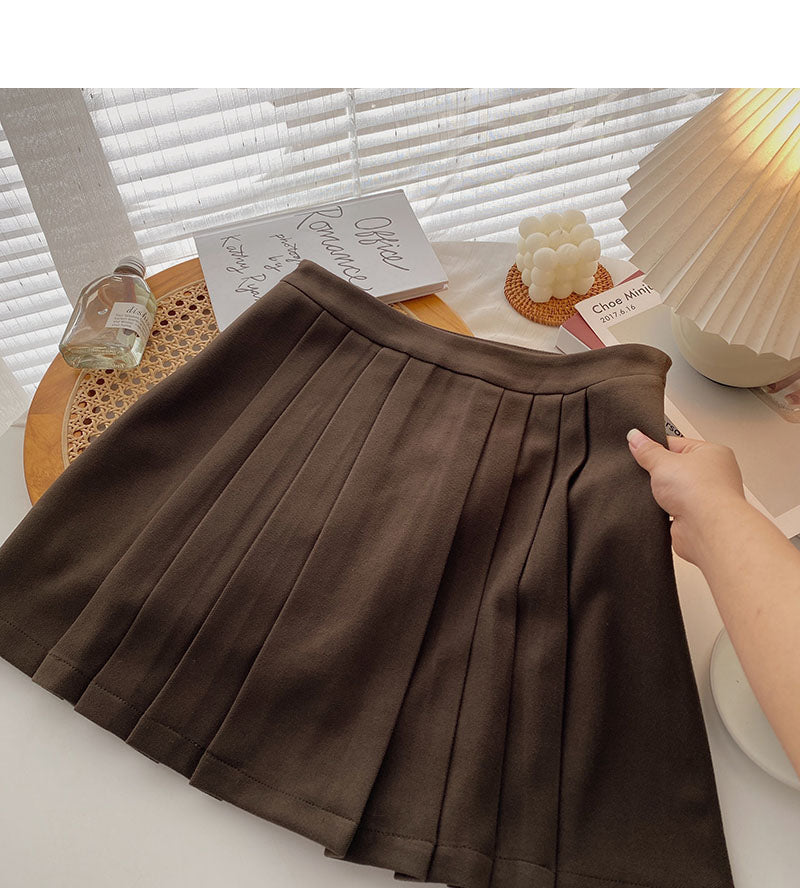 Version coréenne de la jupe taille haute et petit homme, à la mode, fine, couvrant les hanches 5447