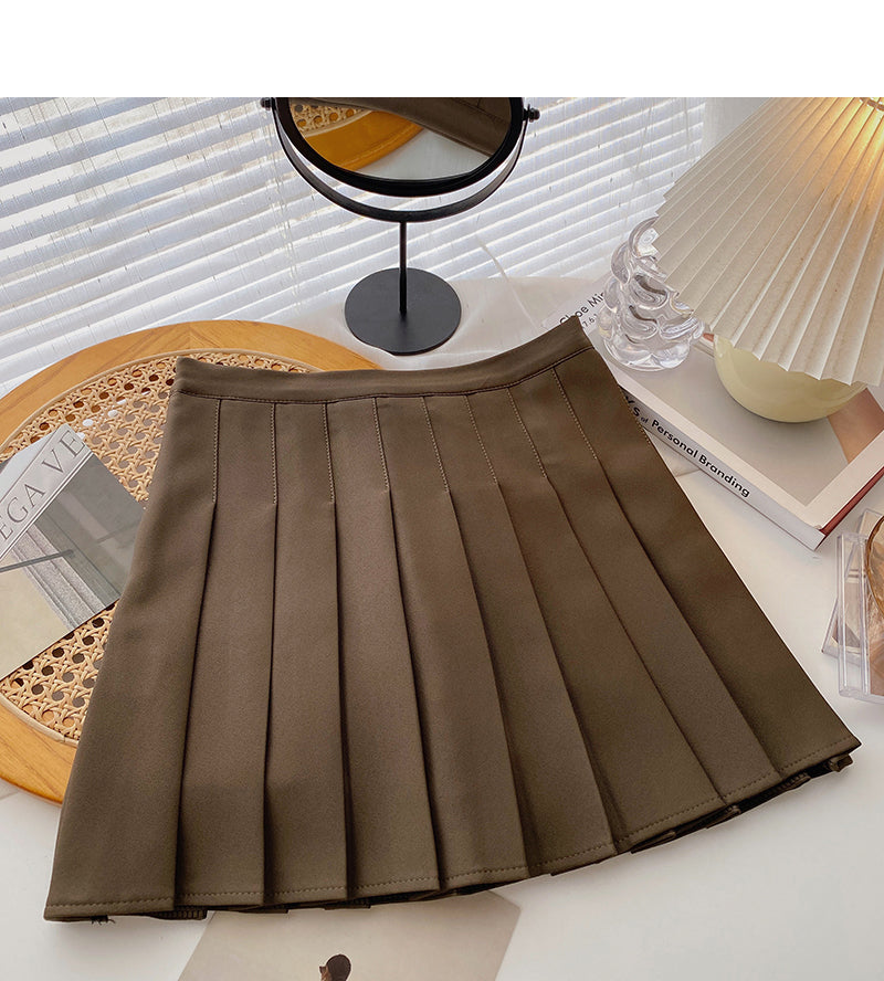 Pleated skirt is a popular solid color high waist A-line skirt  5357