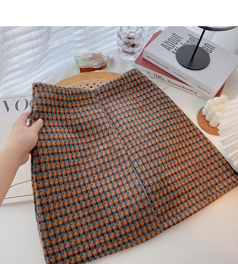 The new Korean retro style shows a thin Plaid hip wrap skirt  5531