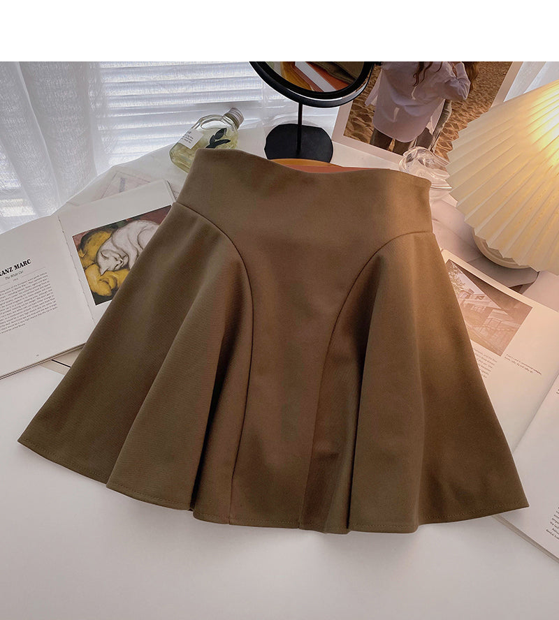 Koreanische Mode im Hongkong-Stil Freizeit einfarbiger Anti-Licht-Rock mit hoher Taille 5497