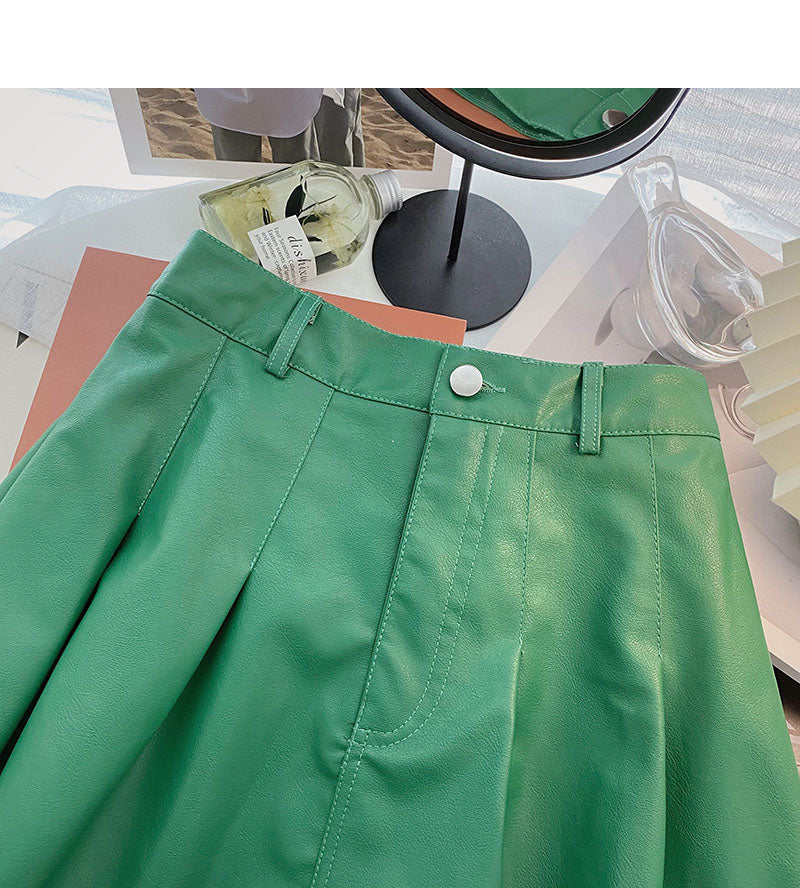Koreanischer dünner modischer altersreduzierender Faltenrock aus Leder mit hoher Taille 5461