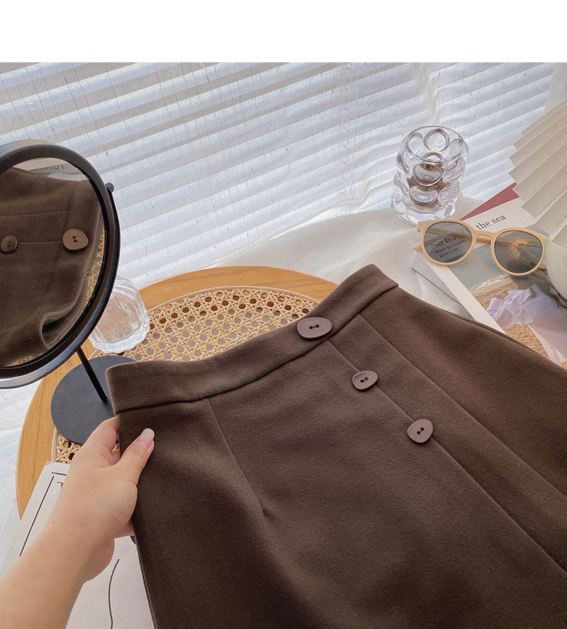 Drei-Knopf-Design mit hoher Taille, ausländischer Stil, altersreduzierender Faltenrock in A-Linie 5442