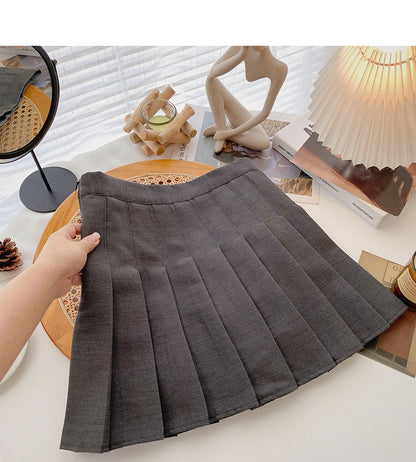 Korean version of age reducing college style solid color high waist A-shaped skirt  5381