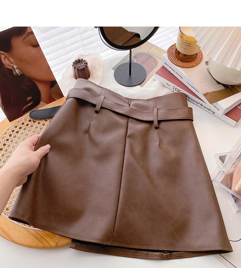 Korean fashion irregular button high waist thin wrap hip leather skirt  5532