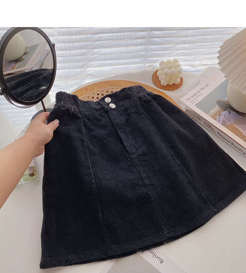 Nouvelle jupe coréenne en forme de A anti-lumière taille haute slim de couleur pure 5417